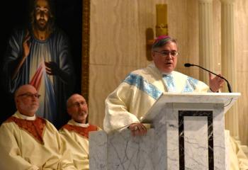 Bishop of Allentown Alfred Schlert preaches the homily on the Solemnity of the Annunciation at St. Ignatius. Concelebrants are Monsignor Edward Domin, pastor of St. Catherine of Siena, Reading, left, and Monsignor Thomas Orsulak, pastor of St. Peter the Apostle, Reading.