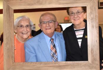 Enjoying the celebratory evening are, from left, Mary Ann and Bob Kulhamer and Helen Wolfer, parishioners of St. Elizabeth of Hungary.