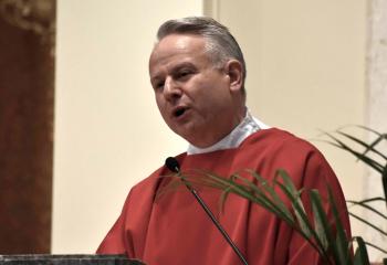 Deacon John Maria, who is scheduled to be ordained a priest Saturday, June 1, preaches the homily.