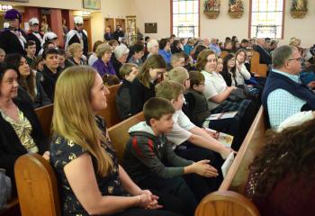 Students from Sacred Heart School, Bath participate in the special Mass. (Photo by John Simitz)