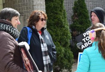 Thayer chats with members of the pro-life community.