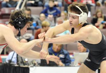 Cole Handlovic, a Becahi junior, right, tangles with senior Dan Mancini of Owen J. Roberts in the PIAA Class AAA semifinals at 152. Mancini became the state champion after edging Handlovic 2-1 on an ultimate tiebreaker, 2-1. Mancini ended the season with a 37-3 record. Handlovic, who fought back and finished fourth in the state, ended the year at 43-7. 