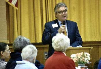 “Because we are Catholic, it is our calling to reach out to those who need it most. No contribution is too small – every dollar makes a difference,” Trust Advisor John Boyer tells those attending the kickoff reception.