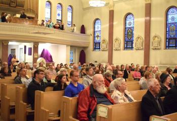 The faithful gather for the evening liturgy at All Saints on Holy Thursday. “On this sacred day when we commemorate the institution of the Most Holy Eucharist, we are afforded the opportunity to reflect upon our relationship with Our Lord present most perfectly in the Holy Eucharist,” said Bishop Alfred Schlert in a Holy Thursday message on social media. (Photo by John Simitz) 