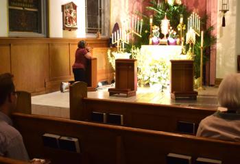 Faithful visit the Lord in silence at St. Joseph, Summit Hill on Holy Thursday. (Photo by John Simitz)