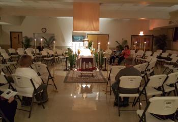 Holy Thursday visitors spend time at the Altar of Repose in the chapel of Assumption BVM, Northampton. (Photo courtesy of Edward Hozza)