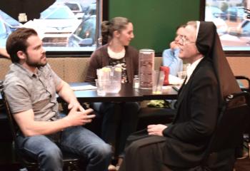 Bobby Campanella, left, parishioner of St. Nicholas, Walnutport, chats with Sister Geralyn Schmidt during the break. 
