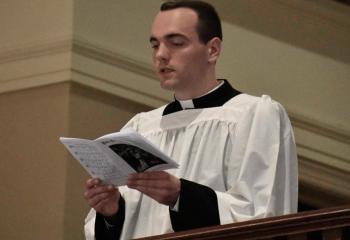 Matthew Kuna, Diocesan seminarian, sings with the choir at the cathedral.