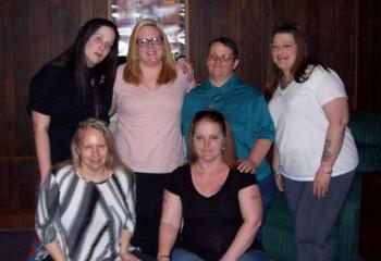 Residents celebrate graduation, from left: front, Lisa Painter and Catina Mejia; back, Mary LaPrad, Sara Dehaven, Caitlin Kasperowicz (graduate) and Christina Wilson.