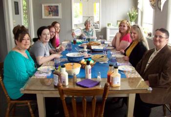 Gathered for Easter dinner are, from left, Catina Mejia, Sara Dehaven, Autumn Yerger, Mary LaPrad, Sister of Mercy Chris Seghetti, Caitlin Kasperowicz, Lisa Painter and Christina Wilson.