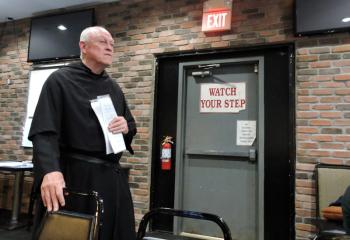 Augustinian (OSA) Father Arthur Purcaro listens to a question while presenting the Theology on Tap session “The Lost Art of Listening.”