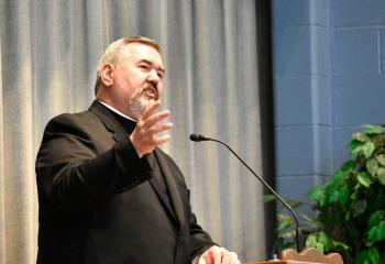 Father Thomas Bortz encourages the new priests to “love their people.”