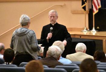 Father Pacholczyk fields a question from a member of the audience.