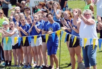 Spectators and competitors cheer on runners during the diocesan-wide meet that drew 21 teams. Notre Dame of Bethlehem placed first and St. Jane Frances de Chantal, Easton placed second.