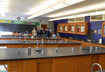 Those attending tour the school’s lab room.