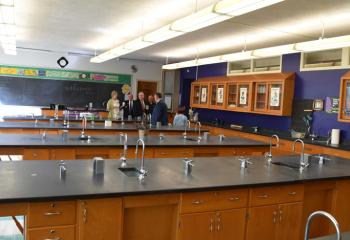 Those attending tour the school’s lab room.