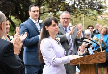 From left, Dominick Copolla, Ashley Russo, Michael Metzger and John Petruzzelli join the crowd in applauding Brooke Tesche.