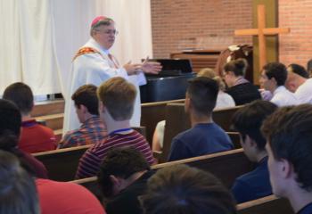 Bishop of Allentown Alfred Schlert delivers the talk “The Diocese of Allentown, a History and Church Built by Saints” to both young men and women.