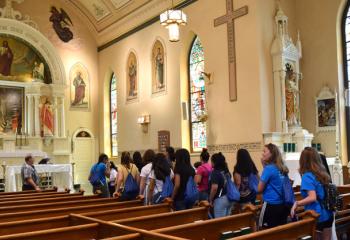 Young women tour Most Blessed Sacrament, Bally during a pilgrimage.