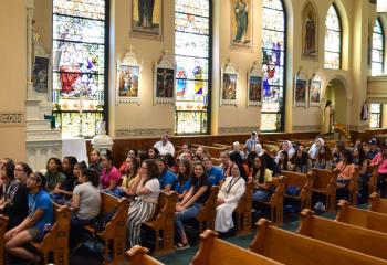 Young women learn about the history of Most Blessed Sacrament during Fiat Days.