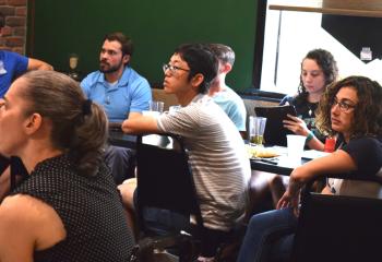 Young adults listen during the discussion “From Islam to Christ.”