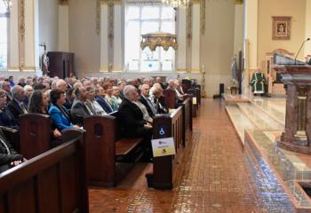 Bishop Schlert preaches the homily.