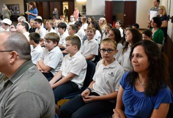 Students from Sacred Heart School, Bath attend the ceremony in support of Father Butera.