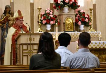 Bishop Alfred Schlert preaches the homily.