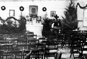 The first Christmas at St. Ursula, when Mass was celebrated in a garage in 1919.