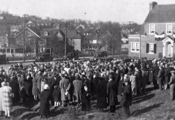 Parishioners attend the groundbreaking of the rectory in 1928.