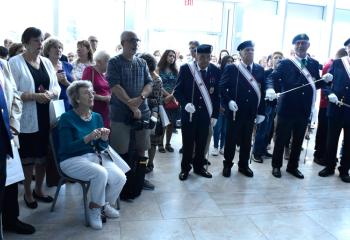 Faithful attend the blessing and dedication ceremony of the new parish center at Holy Family, Nazareth.