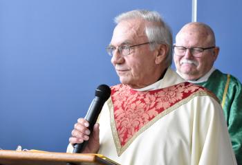 Father Joseph Tobias thanks parishioners for their support in making the parish center a reality.