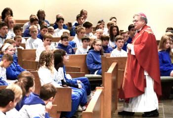 Bishop Schlert preaches the homily during the Mass.