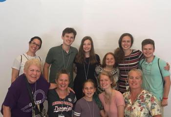 Teresa Heller, front left, pictured with members of Schuylkill Catholic Youth Ministry, celebrates her 30th year attending a Steubenville conference with the Diocese. 