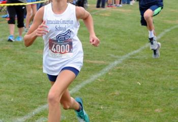 Olivia Schweitzer from Immaculate Conception School, Pen Argyl was the first girl to the finish line during the seventh- and eighth-grade girls’ race. (Photo by Ed Koskey)