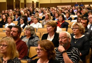 Educators listen to Michele Stuart present “Kids Safety in the Digital Age.”