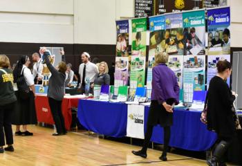 Educators attending the event browse more than 40 vendor exhibits.