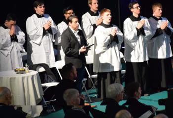 Seminarians attend the Mass.