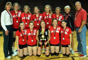 Players and coaches from St. Thomas More, who clinched the title, are from left: front, Alyssa Mullaney, Molly Maskiel, Grace Fifield, Catie McGee and Natalie Tucker; back, coach Mary Rooney, Elizabeth Trump, Milly Wolf, Sarah Furey, Anneliese Quinn, Emma Wells, coach Jessica Reynolds and coach Pat Furey.