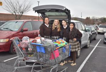 Bethlehem Catholic students bring gifts.