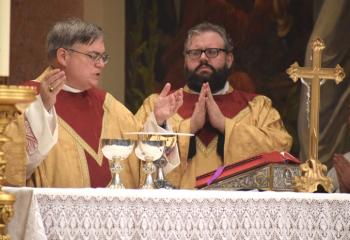 Bishop of Allentown Alfred Schlert celebrates the Christmas Eve Mass at the Cathedral. The Bishop offered his Christmas Masses for alienated or disaffected Catholics, that the power of the Holy Eucharist will call them back home to their family of faith.