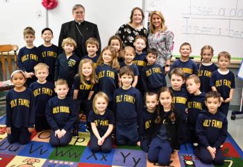 Bishop Schlert with the kindergarten class.