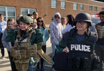 Students dressed up like the career they want to be when they grow up for Vocation/Career Day at Holy Guardian Angels School, Reading. Parents came in to speak about their careers, including a fire truck, a SWAT truck, a state trooper and an ambulance.