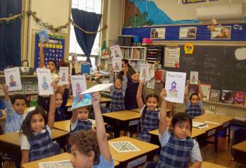 Students at St. Peter School, Reading write letters to their benefactors.