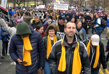 The large crowd can be seen going on for blocks and blocks in this photo of the St. Jane marchers. (Photo courtesy of Andrew Azan III)