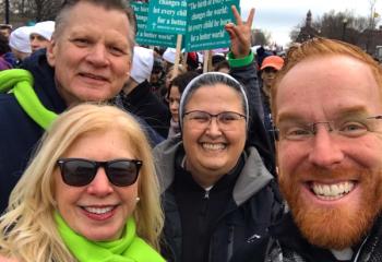 Father Mark Searles, right, and Sister Sophia Maria Peralta from Allentown Central Catholic High School ran into Deacon Steve Javie from the Archdiocese of Philadelphia and his wife Mary-ellen, who had visited the school for Forty Hours. (Photo courtesy of Father Mark Searles)