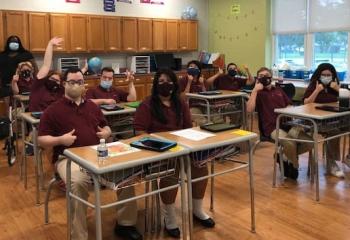 Students at Mercy School in Allentown give 'thumbs up' to new year