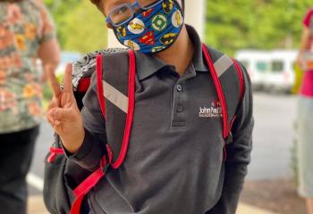 Student arriving for school at John Paul II Special Learning Center