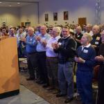 Father Bernard Ezaki, assistant pastor of St. Jane Frances de Chantal, Easton, receives a standing ovation after his presentation, “Sinfulness: The Challenges Men Face Living in the Spirit.” (Photos by John Simitz)