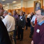 Speaker Marty Rotella, left, talks with Vincent Santvcci, parishioner of Assumption BVM, Northampton, during one of the conference breaks.